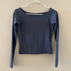 Cotton Blend Off The Shoulder Long-Sleeve Top With A Raw Hem. Fabrics: 96% Cotton, 4% Elastane Measurement: 19"(48 Cm) Length, 18"(46 Cm) Bust Made In: Italy Blue Stretch Crew Neck Long Sleeve Top, Fitted Blue Crew Neck Blouse, Fitted Blue Blouse With Crew Neck, Light Blue Long Sleeve Tops For Fall, Fitted Blue Long Sleeve Top For Spring, Blue Stretch Long Sleeve Blouse, Casual Washed Blue Stretch Tops, Fitted Light Blue Long Sleeve Top, Blue Cotton Stretch Long Sleeve Top