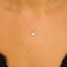 Explore our Illusion Diamond Necklace, a captivating piece that emanates the hidden fragrance of nature, making it a must-have accessory in your collection.   Diamond Specifications: * Type: Natural, Genuine Diamonds (Ethically Mined) * Color: D-F (whitest level of white Diamonds) * Clarity: VS/VVS (Microscopically clean) * Total Weight: 0.30 Ct * Number of Stones: 7 Natural Diamonds * Shape: Round Brilliant * Cut: Excellent * Setting Type: Prong Setting  Gold specifications: *Caliber: Solid 18K Delicate Flower Shaped Jewelry With Brilliant Cut, Delicate Flower Pendant Necklace For Her, Dainty Diamond White Flower Pendant Jewelry, Delicate Diamond White Flower Jewelry, Delicate Diamond White Flower-shaped Jewelry, Brilliant Cut Flower Pendant Jewelry, Delicate Flower Shaped Diamond Jewelry, Delicate Diamond Flower Jewelry, Elegant Flower-shaped Brilliant Cut Jewelry