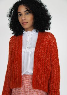 70% baby alpaca, 7% merino wool, 23% polyamide Hand knitted, large jersey stitches, open front, waist length Made in Peru Oversized Red Knitted Cardigan, Rust Cardigan, Red Long Sleeve Textured Knit Cardigan, Oversized Alpaca Long Sleeve Cardigan, 100% Peruvian Alpaca Sweater Women, Vintage Indigo, Silk Shawl, Baby Alpaca, Waist Length