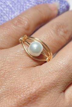 Excited to share this item from my #etsy shop: Pearl Gold Plated Ring, gold wire ring, pearl ring, wire wrapped ring, wedding jewelry, bridesmaid jewelry, special gift for her, wire ring #pearl #lovefriendship #specialgiftforher #bridesmaidjewelry #pearlring Elegant Wire Wrapped Pearl Ring For Wedding, Elegant Wire Wrapped Pearl Wedding Ring, Elegant Wire Wrapped Wedding Rings, Handmade Adjustable Pearl Ring For Wedding, Elegant Adjustable Wire Wrapped Pearl Ring, Gold Wire Wrapped Pearl Ring Gift, Elegant Wire Wrapped Ring For Gift, Elegant Wire Wrapped Rings For Gifts, Elegant Wire Wrapped Ring As Gift