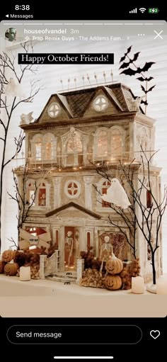 an image of a halloween house with pumpkins