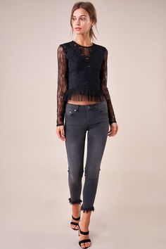 The Temptress is a sheer lace top covered in a floral design. The top features a high neckline, long fitted sleeves, and a darted bodice with a cropped, pleated hem. This ultra-sultry number is perfect for showing off your midriff in jeans and heels. Model is 5'9" and wearing size small. Pre-Order Now! Estimated Shipping Date October 25, 2019. Available in black. 100% polyester. Imported. Sheer Lace Top, Fitted Sleeves, Lace Long Sleeve, October 25, Sheer Lace, High Neckline, Long Sleeve Lace, Pre Order, Lace Top