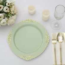 a table setting with flowers and silverware