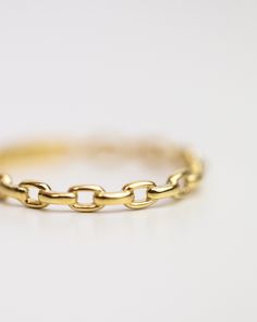 14k Solid Oval Link Ring Crafted from 14-karat yellow gold, this timeless piece features open oval links, lending a delicate, chain-like aesthetic to any stack of rings. Perfect for elevating any look with an effortless touch of elegance. Material: 14k Yellow Gold Width: 2.2mm Elegant Yellow Gold Chain Rings, Elegant Gold Link Rings, Timeless Gold Chain Ring For Formal Occasions, Elegant Gold Chain Ring For Formal Occasions, Elegant Formal Gold Chain Ring, Elegant Gold Oval Link Chain Ring, Yellow Gold Oval Stackable Rings, Tarnish Resistant Oval Stackable Rings In Fine Jewelry, Classic Yellow Gold Chain Ring For Formal Occasions