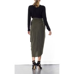 The Blake Tulip skirt is super flattering on any size. Coming in one size fits all, this wrap-around tulip style is designed to sit high on the waist. It's finished with a wrap-around belt that ties at the side, to nip in your waist for a flattering effect. Tie into a bow or leave as it is. This dramatic outline is best complemented with a fitted top. Hand wash recommendedWash with like colours to avoid colour transferPress on reverse sideIron on low heat100% polyester Chic Draped Lined Skirt Bottoms, Fitted Draped Bottoms For Work, Chic Fitted Wrap Bottoms, Chic Wrap Bottoms For Workwear, Flowy Lined Wrap Skirt, Chic Wrap Lined Skirt, Flowy Wrap Skirt With Tie Waist, Elegant Wrap Skirt With Lining, Asymmetrical Tie-waist Fitted Skirt