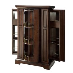 a tall wooden cabinet with glass doors and shelves on the front, in dark wood