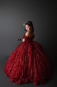 Our beautiful “Ruby Shimmer" – designed with a gorgeous red shimmer fabric- this gown is perfect for fine art portraits and so much more. Absolutely gorgeous in person - your little one will feel like a princess. For flex fitting we have added adjustable tie shoulder straps which you can lower or pull tighter and an elastic back which adds to the ease of size adjustment. Her skirting features bridal soft tulle underneath. An added built in petticoat gives the skirting a semi pouf. The skirting i Red Ball Gown With Fitted Bodice For Pageant, Red Ball Gown With Fitted Bodice For Pageants, Elegant Red Gown For Pageant, Elegant Red Pageant Dress For Prom, Elegant Red Pageant Dress, Glamorous Red Ball Gown For Gala, Red Floor-length Gown For Pageant, Elegant Red Pageant Dress For Wedding, Glamorous Red Ball Gown