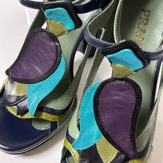 condition 9/10 color blue × purple × green size 36.5 (us 6.5, uk 3.5) insole 24cm, width 8cm, heel height 10cm, platform height 2cm the sole of the right heel is slightly chipped. made in italy free shipping worldwide (takes around 5days) Purple High Heel Sandals With Sculpted Heel, Blue High Heel Sandals With Leather Sole, Green Open Toe Sandals With Sculpted Heel, Green Sandals With Sculpted Heel, Green Sandals With Sculpted Open Heel, Green Leather Sole High Heels, Green Heels With Leather Sole And Round Toe, Luxury Green Platform Heels, Spring Green Heels With Leather Sole