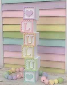 a stack of blocks with the word love spelled out