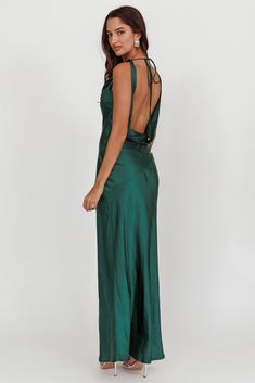 Satin maxi dress Backless Invisible side zipper Cowl neckline You'll look like you just stepped straight off the red carpet in our gorgeous Cassiopeia dress. Featuring a cowl neckline and an open, draped back. It's perfect for a wedding or special birthday celebration. Team it with diamante heels and a clutch for a show stopping look. MODEL INFO Model is wearing size XS Height: 5'8" Bust: 31.0" Waist: 24.0" Hips: 35.0" CARE Hand Wash Cold. Do Not Iron. MATERIAL POLYESTER Backless Green Dress, Wedding Guest Dress Silk, Green Backless Dress, Maxi Wedding Guest Dress, Green Satin Prom Dress, Maxi Dress Backless, Low Back Dress, Prom Formal Dresses, Yellow Bridesmaid Dresses