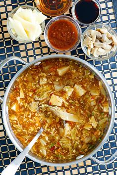 the food is prepared and ready to be eaten on the table with other dishes around it