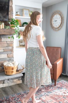 This is a skirt that falls below the knee and features pleats and a floral pattern. If you are wanting a skirt that evokes a sense of joy and movement as the seasons change from winter to spring this is it! This is a fun and trendy skirt with a floral pattern which might be the perfect addition to your wardrobe! Spring Skirt, Winter To Spring, Seasons Change, Trendy Skirts, Spring Skirts, The Seasons, Changing Seasons, The Knee, Floral Pattern