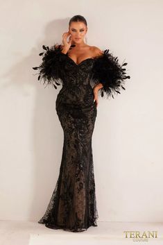 Step into the spotlight with the 241E2479 Asymmetrical Embroidered Off-Shoulder Trumpet Column Evening Dress. This gown is a harmonious blend of sophistication and allure, designed to make you the center of attention. Featuring a seductive off-shoulder neckline, a figure-hugging bodycon silhouette, and intricate embroidery on luxurious Point D’esprit fabric, this dress exudes timeless elegance. With color options in Black and Nude, you can opt for classic allure or understated chic. The addition of long sleeves offers a hint of modesty without compromising on allure. Elevate your evening with this extraordinary dress and make an unforgettable entrance. Luxury Fitted Off-shoulder Gown, Luxury Embellished Off-shoulder Evening Dress, Luxury Embellished Off-shoulder Dress, Luxury Off-shoulder Gown For Party, Black Evening Dress With Asymmetrical Neckline For Wedding, Fitted One-shoulder Embellished Evening Dress, Fitted Evening Dress With Asymmetrical Neckline For Gala, Songs As Outfits, Nude Evening Dresses