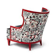 a red and white chair with flowers on it