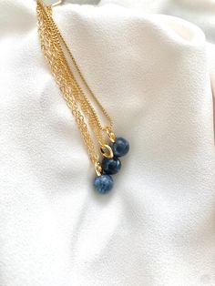 **Each piece in my shop, I personally create and photograph. (All photos are property of The Cord Gallery LLC) Thank you for supporting my small business.Add the perfect minimal touch to any outfit with these stunners! Features a genuine Lapis Lazuli Gemstone Ball pendant with an oversized gold filled connector bail. No two stones with be exactly alike as they are all natural. {Stone sizes are 8mm}These are stunning on their own and look great layered with other pieces. Hangs on your choice of c Ball Pendant Necklace, Indie Jewelry, Lapis Lazuli Gemstone, Figaro Chains, Ball Pendant, September Birthstone, Thank You For Support, Blue Crystals, Lapis Lazuli