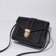 Brand Name: HEONYIRRYShape: FLAPHandbags Type: Messenger BagsOrigin: CN(Origin)Main Material: PUClosure Type: COVERHardness: SOFTStyle: FashionModel Number: B462 Flap bagLining Material: PolyesterOccasion: VersatileGender: WOMENPattern Type: SolidNumber of Handles/Straps: SingleInterior: No PocketColors: Yellow,Wine Red,Black,Pink,GrayType: Bag PurseType 1: Women bag,Bags for women 2018Type 2: Shoulder bag,Messenger bag,Crossbody bagType 3: Mini Pouch,Mobile phone bagType 4: Bolsa femininaType 5 Black Mini Bag, Girls Messenger Bag, Cute Mini Backpacks, Trendy Bags, Mini Backpacks, Handbags Affordable, Leather Gifts, Handbags And Purses, Mini Crossbody Bag