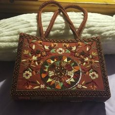 Rust Unique Sequin Handbag Features Embroidered Flowers And Leaves. Would Look Great With Any Type Of Chinese Outfit. I Think They Are Called Sari's Or Cute Accessorie For A Rust Boot, Heel Or Sandals With Jean's And A Cute Top. Price Firm Size 10in Length 7.5 Height 2.25 Width Embroidered Rectangular Satchel, Brown Embroidered Rectangular Bag, Embroidered Brown Rectangular Satchel, Brown Embroidered Rectangular Satchel, Embroidered Brown Shoulder Bag For Shopping, Brown Embroidered Shoulder Bag For Shopping, Embroidered Brown Tote Satchel, Brown Embroidered Tote Satchel, Brown Embroidered Bag For Daily Use