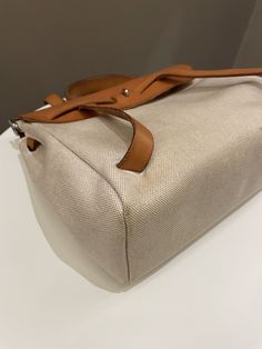 Hermes Herbag 31 Backpack/ShoulderBeige Canvas PHWSize 31 x 24 x 10.5 cmD Square stamp6-7/10 (overall sign of use)Includes item itselfPrice now 1880 sgd 1430 usd CN6002-01 Designer Canvas Travel Bag With Top Handle, Designer Travel Canvas Bag With Top Handle, Designer Top Handle Canvas Bag For Travel, Designer Coated Canvas Shoulder Bag Backpack, Designer Coated Canvas Backpack Style Shoulder Bag, Designer Coated Canvas Backpack Shoulder Bag, Luxury Large Capacity Satchel Canvas Bag, Designer Backpack Shoulder Bag For Shopping, Luxury Satchel Backpack With Dust Bag