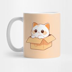 a white cat sitting in a box on top of a coffee mug that says hello kitty