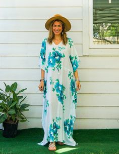 Embrace the essence of summer with our Hibiscus Floral Boho Kaftan Dress. This handmade kaftan, ideal for beachwear, loungewear, and as a swimsuit cover-up, captures the tropical Hawaiian vibe. Crafted from premium rayon, it promises comfort and style in equal measure.  Features ‣ Boho/Hippie/Hawaiian/Beach/Tropical Theme: Perfect for a relaxed, stylish look suitable for various occasions. ‣ Loose Fit: Designed to provide maximum comfort with a relaxed fit. ‣ Adjustable Rope: Features an adjusta V-neck Beach Dress For Beach Wedding, Beachy Maxi Dress With Tropical Print For Beach Cover-up, Tropical V-neck Kaftan For Beach Cover-up, Floral Print V-neck Cover-up For Vacation, Tropical V-neck Kaftan For Summer, Tropical V-neck Maxi Dress For The Beach, Tropical V-neck Pool Dress, Flowy V-neck Tropical Kaftan, V-neck Floral Print Maxi Dress For Poolside