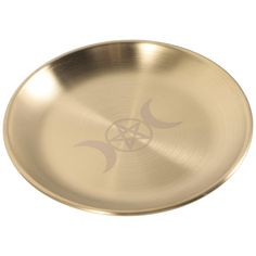 a brass plate with an inverted symbol on it