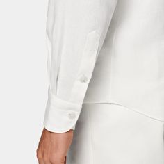 This casual white shirt is tailored to a relaxed fit, and features a single cuff and classic collar. Casual White Shirt, Tuxedo Pants, Scarf Hat, Pure Linen, Suspenders, White Shirt, Linen Fabric, Workout Shirts, The White