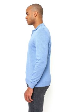 Crafted entirely from cotton, this long-sleeve polo is a comfortable option on cooler days. 25" length Spread collar Long sleeves 100% cotton Machine wash, dry flat Made in Turkey Model stats: 6'1" height, 32" waist. Blue Casual Polo Sweater With Polo Collar, Blue Casual Polo Sweater, Blue Casual Polo Shirt With Ribbed Collar, Casual Blue Polo Shirt With Ribbed Collar, Fall Blue Cotton Polo Shirt, Classic Long Sleeve Polo Shirt For Spring, Long Sleeve Cotton Polo Shirt, Blue Collared Polo Sweater For Fall, Blue Polo Collar Sweater For Fall