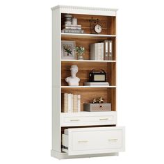 a white bookcase with drawers and books