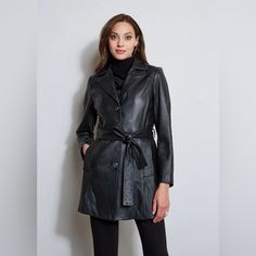 Brand New With Tags: Tahari Nicole Belted Leather Coat Unleash Your Inner Biker Babe In This Sleek Leather Trench Coat From Tahari, Designed With A Self-Tie Belt To Define The Waistline. Approx. Model Height Is 5'8" And She Is Wearing A Size Small Approx. 32" Long From Center Back To Hem Notched Collar; Front Button Closures Removable Belt Two Side Pockets Lined Shell: Leather; Lining: Polyester Professional Leather Clean Imported Elegant Winter Leather Jacket With Belt, Elegant Belted Leather Jacket For Winter, Elegant Black Leather Outerwear, Belted Leather Jacket For Office, Office Leather Belted Jacket, Classic Belted Leather Jacket, Classic Leather Jacket With Belt, Classic Leather Belted Jacket, Black Belted Leather Jacket