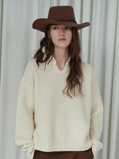 This luxurious open-collar sweater combines the casual appeal of a polo shirt with the warmth of a premium wool-alpaca blend, featuring a naturally fuzzy texture for ultimate comfort. The unique Kaneko double-sided structure and 5-gauge knitting technique elevate its craftsmanship, while the relaxed silhouette ensures versatile wearability. Available in a sophisticated beige shade, this piece offers a perfect balance of style and comfort with its thoughtfully designed free size that accommodates Cream Knit Polo Sweater For Fall, Cozy Beige Polo Sweater For Fall, Fall Beige Polo Sweater With Ribbed Collar, Beige Ribbed Collar Polo Sweater For Fall, Fall Beige Wool V-neck Sweater, Cream Polo Sweater With Ribbed Collar For Winter, Collared Cream Polo Sweater For Winter, Fall Cream Polo Sweater With Ribbed Collar, Cream Polo Sweater For Workwear In Fall