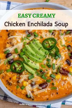 a bowl filled with chicken enchilada soup and topped with avocado