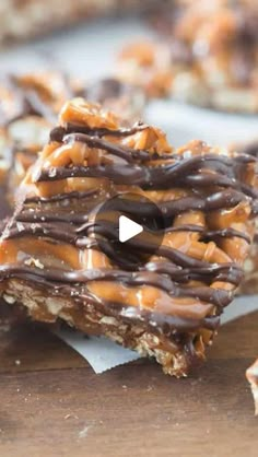 chocolate and caramel pretzel bars on a cutting board