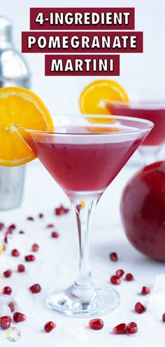 the drink is garnished with pomegranate and garnished with orange slices