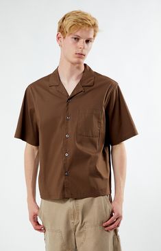 Unwind in style with PacSun's Solid Oversized Camp Shirt. Boasting a laid-back vibe with its collared neckline, short sleeves, and relaxed fit, this shirt is perfect for casual outings. Complete with a left chest pocket for added convenience, it's a versatile wardrobe staple for easy, breezy days.


	Collared neckline
	Short sleeves
	Oversized fit
	Button closures
	Left chest pocket
	69% cotton, 26% nylon, 5% spandex
	Machine washable
	Model is wearing size medium
	Model Measurements: 6’3”  Height, 28” Waist, 33.5” Hips Pacsun Mens, Versatile Wardrobe, Camp Shirt, Easy Breezy, Camping Shirt, Summer Kids, Shirt Price, Exclusive Collection, Model Measurements