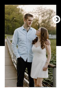 a man and woman standing next to each other on a bridge