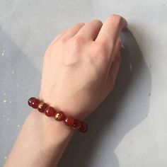 "This is a mystical crystal bracelet, with the fusion of red onyx with the power of a Japanese Ninja -- with the Kuji Kiri 9 Hand Seal! It gives the power, the focus, and the protection to the person who wear it. Size(this brace let comes in 2 sizes, please select carefully): -----Small: Bead diameter: 3/8 inch (10 mm) Bracelet circumference: 6 inch (15 cm) -----Medium: Bead diameter: 1/2 inch (12 mm) Bracelet circumference: 7 inch (18 cm) Materials: Red Agate Onyx 9 Golden Power Symbol on Red O Japanese Ninja, Crystal Protection, Meditation Bracelet, Black Onyx Bracelet, Onyx Bracelet, Red Agate, Crystal Bracelet, Golden Color, Crystal Bracelets