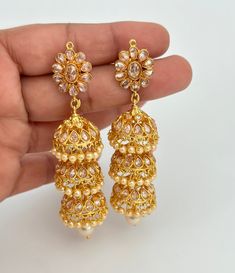 Gold Plated Polki Jhumka/Polki stone Jhumka/Indian Jewelry/Pakistani/Punjabi/Indian/Statement earring/Bridal earring/Indian wedding Double Jhumki length 2.4 inches, width 0.9 inches Triple Jhumki length 3.1 inches, width 0.9 inches Lightweight and elegant Can be paired with any dress Closure: Pushback This is 100% Handmade jewelry. So Color, shades, texture displayed may slightly vary from the actual product due to digital image limitations. We request you to consider these minor variations. Ple Luxury Bollywood Multicolor Jhumkas, Luxury Yellow Gold Fusion Jhumkas, Luxury Round Bollywood Jhumkas, Luxury 22k Gold Bollywood Bridal Earrings, Luxury Temple Jewelry Chandbali Jhumkas, Jhumkas With Stone Work For Eid Reception, Temple Style Bridal Earrings With Tilla For Eid, Eid Jhumkas With Stone Work For Reception, Eid Reception Jhumkas With Stone Work