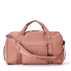 Front view of Monaco garment duffle in warm dust Blush Rectangular Travel Bag, Functional Pink Bags For Weekend Trips, Elegant Pink Luggage For Travel, Pink Travel Gym Bag With Adjustable Strap, Pink Gym Bag With Adjustable Strap For Travel, Versatile Everyday Blush Bag, Pink Gym Bag With Adjustable Strap, Functional Pink Duffle Bag For On-the-go, Functional Pink Bags For Trip