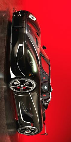 a futuristic car is shown from above on a red background with black and white accents