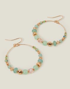 Gilded in gold and threaded with green and pink beading, these earrings boast a single hoop that hangs from a wire hook.Non-refundable. Pearl Jewelry Shop, Drop Hoop Earrings, Pearl Bridal Jewelry, Book Jewelry, Chunky Jewelry, Waterproof Jewelry, Earrings Hoop, Beaded Hoops, Green And Pink