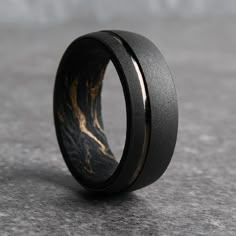 The Monaco Black and Gold Carbon Fiber Wedding Ring Men’s Wedding Bands With Wood, Stylish Ring For Men, Carbon Fiber Rings For Men, Mens Black Rings, Black Mens Engagement Ring, Men’s Wedding Rings Simple, Thorum Rings, Men’s Wedding Rings, Mens Unique Wedding Bands