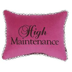 a pink pillow with black lettering that says high maintenance on the front and back side