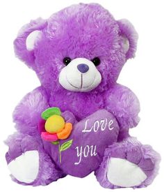 a purple teddy bear holding a heart with the words love you on it and a flower