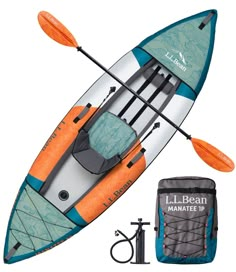 an inflatable kayak with paddles and accessories