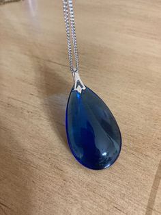 Blue Pear-shaped Drop Necklace For Gift, Blue Teardrop Drop Necklace For Formal Occasions, Formal Blue Teardrop Drop Necklace, Blue Teardrop Necklace For Party, Blue Drop Necklaces For Party, Blue Long Drop Necklace As A Gift, Blue Long Drop Necklace As Gift, Blue Long Drop Necklace For Gift, Blue Teardrop Drop Necklace For Party