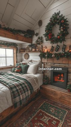 a bedroom decorated for christmas with wreaths on the wall and fireplace in the corner