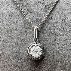 With an Old Mine cut diamond weighing 0.58ct. within a six prong mounting, fashioned in platinum. On an 18 inch platinum chain. Diamond Angel, Solitaire Diamond Pendant, Platinum Chain, Old Mine Cut Diamond, Snake Pendant, Angel Pendant, Navy Velvet, Cameo Brooch, Solitaire Diamond