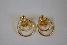 Vintage pair of 14kt yellow gold forward facing loop earrings Etched designs in the gold reflect the light beautifully Excellent condition Weight is 1.8 grams Etched Designs, Loop Earrings, Vintage Costume Jewelry, Costume Jewelry, The Gold, Etsy Earrings, Stud Earrings, Yellow Gold, United States