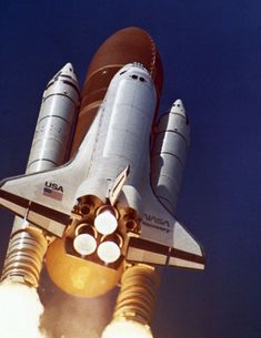 the space shuttle is flying through the air