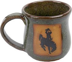 Western Bronc Coffee Cup in Sea Mist Green - Your Western Decor Western Cups, Western Pottery, Bucking Bronco, Pottery Collection, Lake Havasu City, The Blue Mountains, Western Decor, Blue Mountain, Microwave Oven